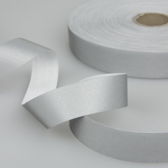 Лента Светоотражающая пришивная 25мм серая(коэф.отраж.250-350) (100м) фото 1